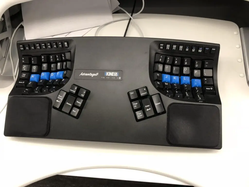 Computer Keyboard 1 2018-06-16 - Image of Ergonomic computer keyboards, An image of a person sitting
