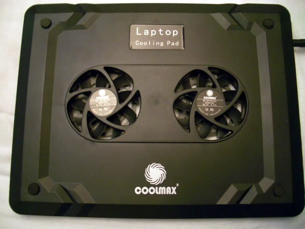Laptop cooler - a laptop with two fans on top of it