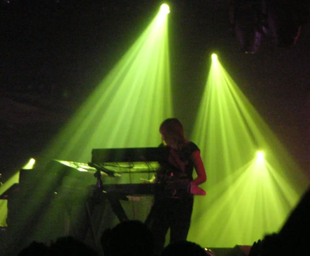 File:Sister Bliss Hull 05.jpg - a man playing a piano on stage with lights